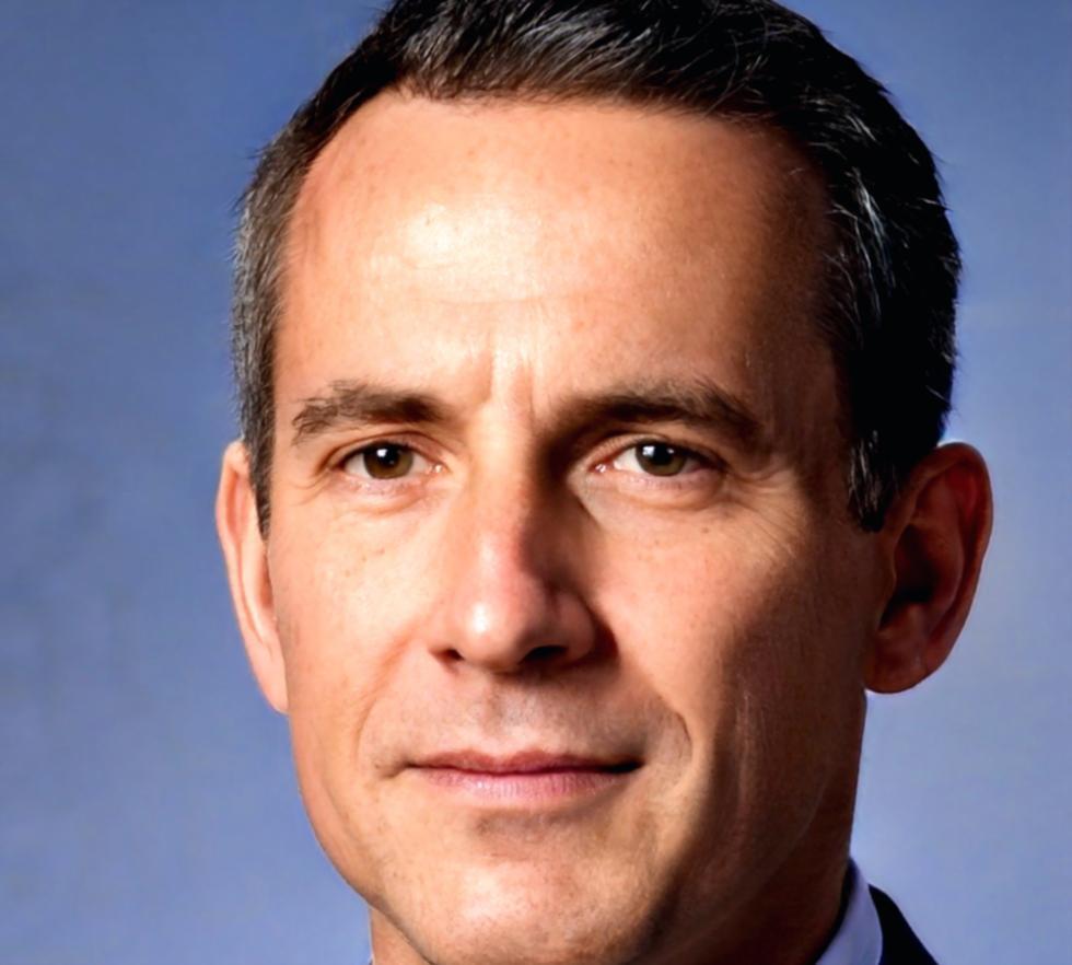 Investment advisor reviewing portfolio strategy with client materials